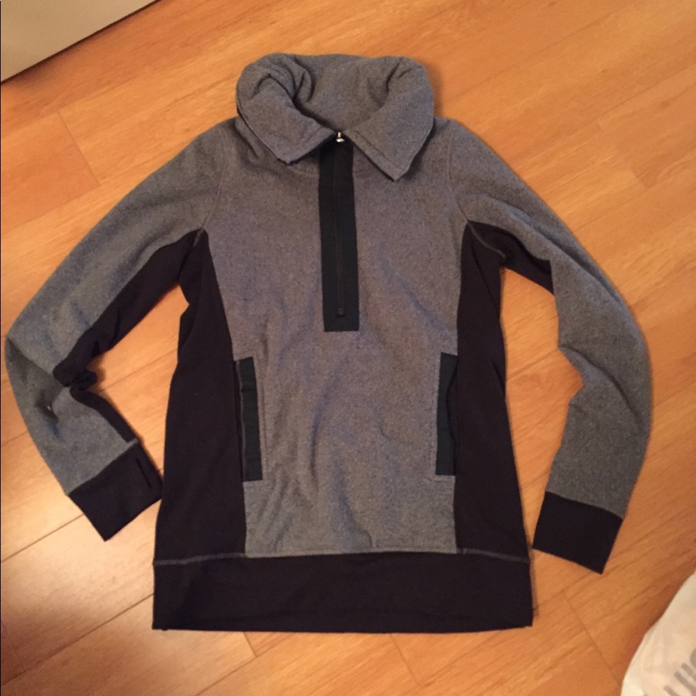 Never worn gray and black lulu jacket with pockets